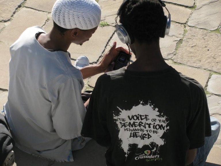 Two musicians preparing their music - click on the photo for more